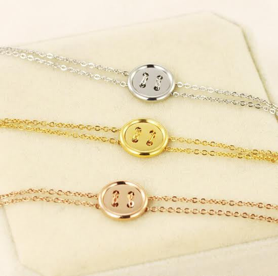 Beautiful Stainless Steel 18ct Plated Button Bracelet